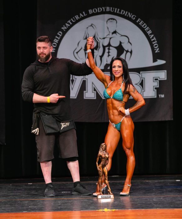 Shavonne Tedstone wins the Overall Bikini Championship at the 2019 INBF Monster Mash promoted by Nancy Andrews